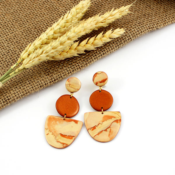 Orecchini Cernit in metallo effetto pietra champagne e bronzo Orecchini Cernit in metallo effetto pietra champagne e bronzo