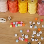 Assortimento di 200 perline- Lettere - 7 mm Giallo - Bianco