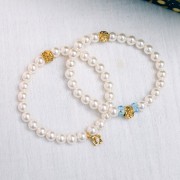 Ciondolo fiore 7 mm cabochon imitazione madreperla acciaio inox 304L dorato x1