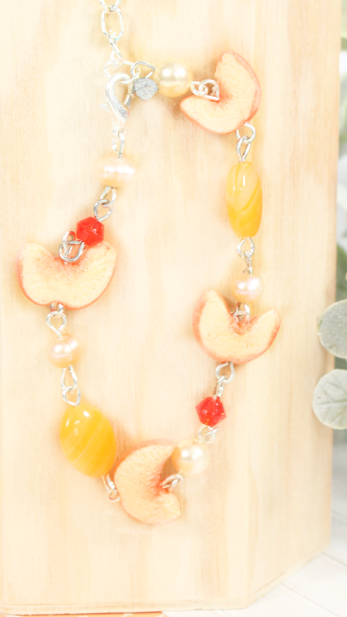 Schema Bracciale misto di pesca e perline in argilla polimerica Schema Bracciale misto di pesca e perline in argilla polimerica