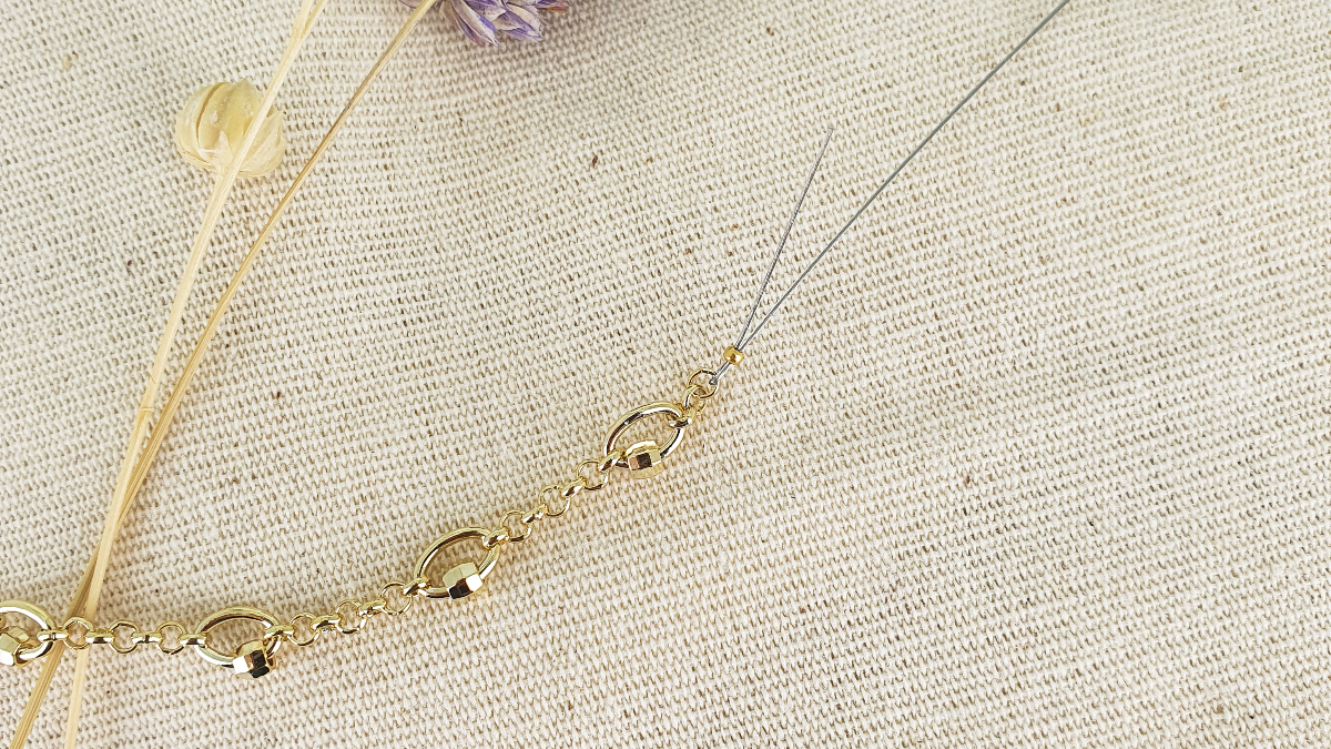 Collana con ciondolo occhio e zirconi : Tappa 2 Collana con ciondolo occhio e zirconi : Tappa 2