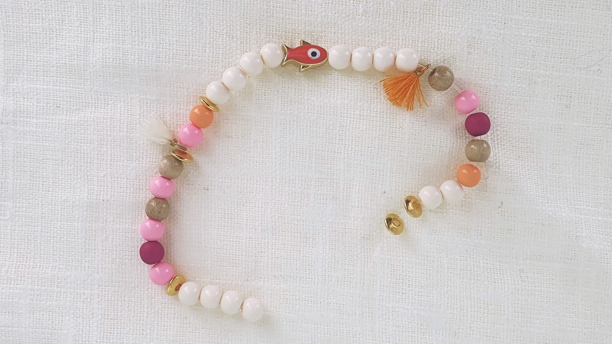 Tutorial bracciale elastico con perline colorate : Tappa 3 Tutorial bracciale elastico con perline colorate : Tappa 3