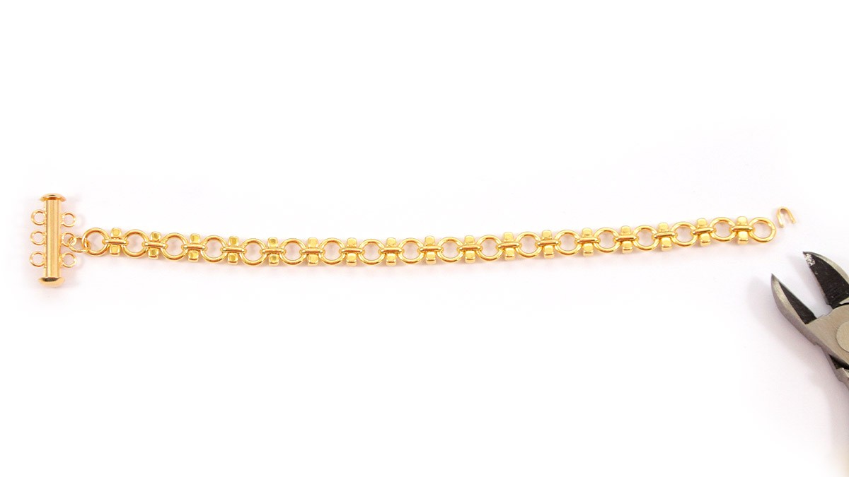 Bracciali a catena in oro con ciondolo a forma di trifoglio : Tappa 1 Bracciali a catena in oro con ciondolo a forma di trifoglio : Tappa 1