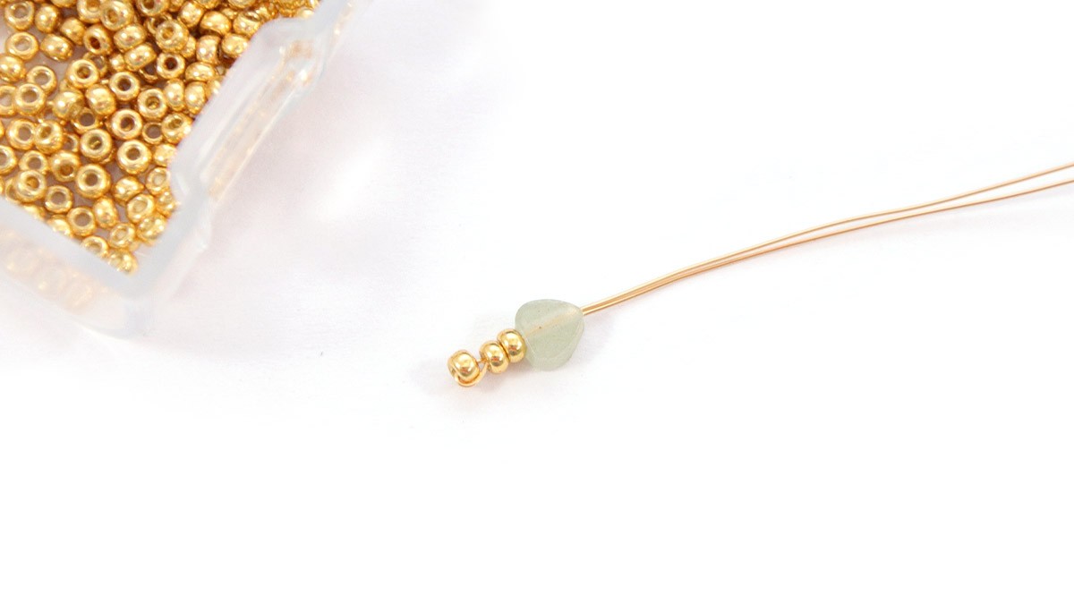 Bracciali a catena in oro con ciondolo a forma di trifoglio : Tappa 6 Bracciali a catena in oro con ciondolo a forma di trifoglio : Tappa 6