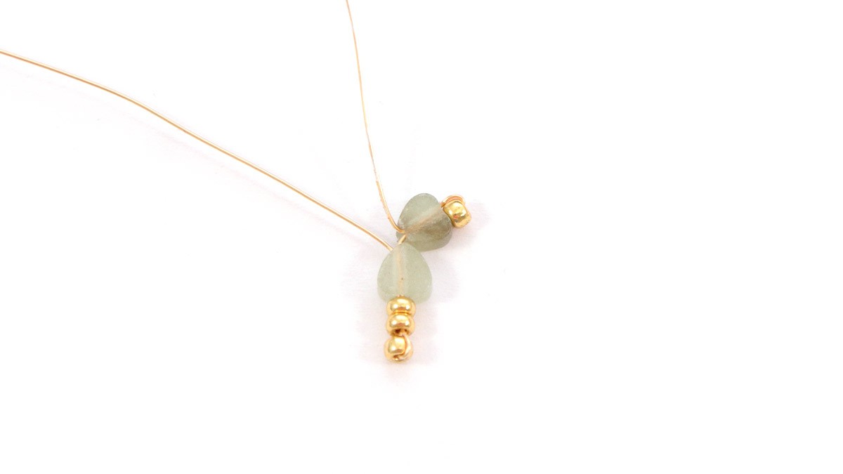 Bracciali a catena in oro con ciondolo a forma di trifoglio : Tappa 7 Bracciali a catena in oro con ciondolo a forma di trifoglio : Tappa 7