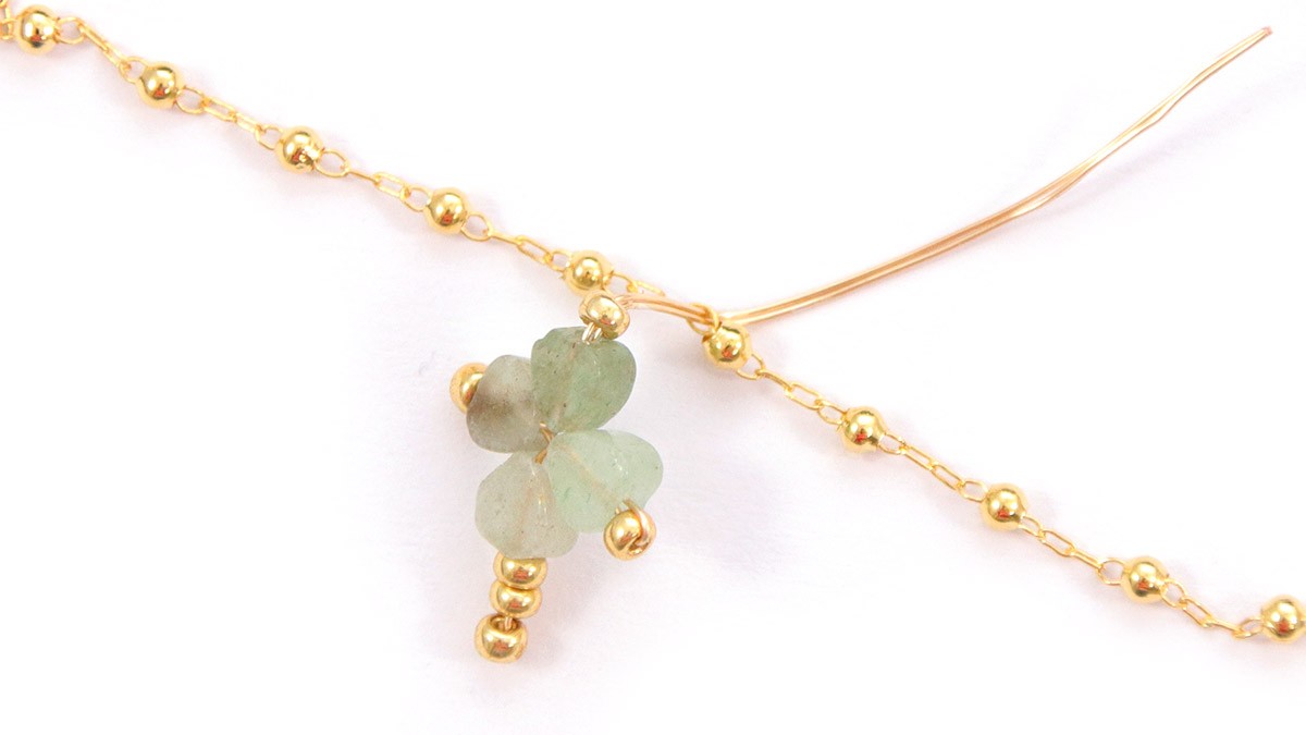 Bracciali a catena in oro con ciondolo a forma di trifoglio : Tappa 10 Bracciali a catena in oro con ciondolo a forma di trifoglio : Tappa 10