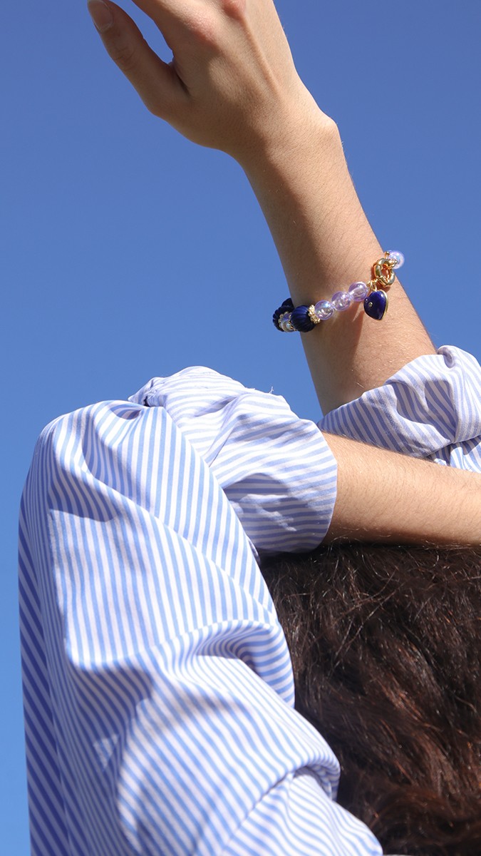 Schema Bracciale con grandi perle rotonde trasparenti e striate Schema Bracciale con grandi perle rotonde trasparenti e striate