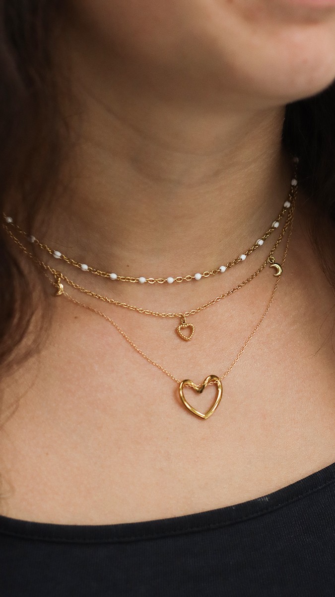 Schema Trio di collane pendenti a forma di cuore in acciaio inossidabile placcato oro Schema Trio di collane pendenti a forma di cuore in acciaio inossidabile placcato oro