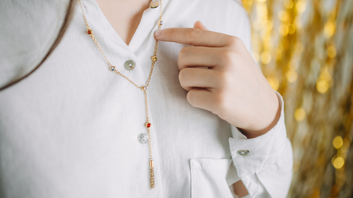 Schema Collana a cascata con zirconi e pompon in acciaio inossidabile Schema Collana a cascata con zirconi e pompon in acciaio inossidabile